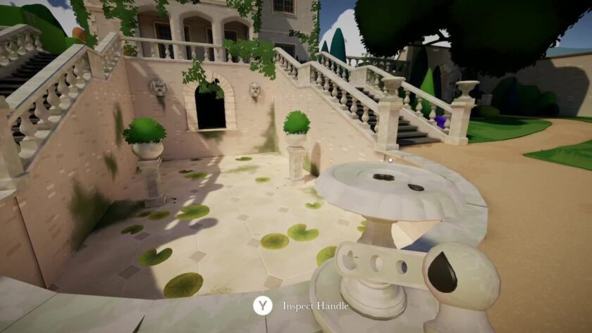 The grotto near the side terrace. It consists of a large pond-like basin containing lily pads, but is currently empty of water. There is an archway on the opposite side.