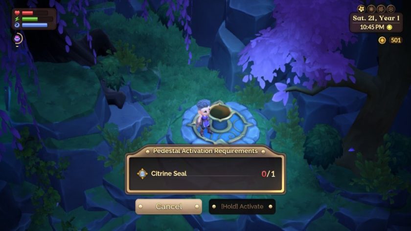 a fasat travel pedestal beside a path surrounded by trees