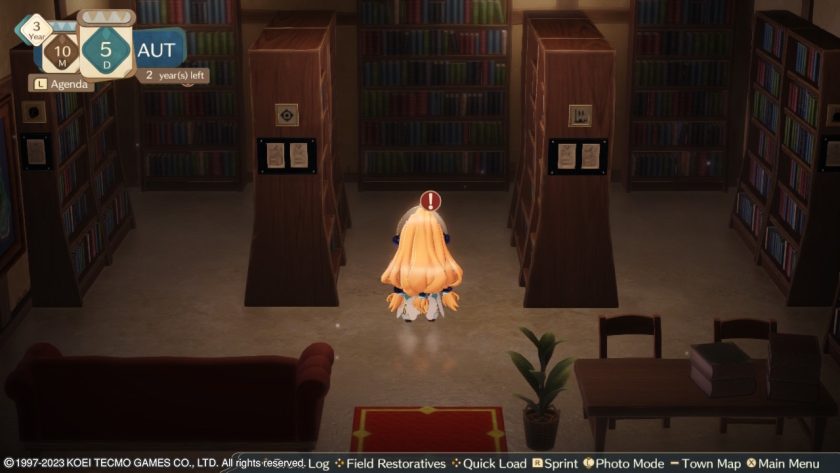 Marie is in the library, with a red exclamation mark above her head. 