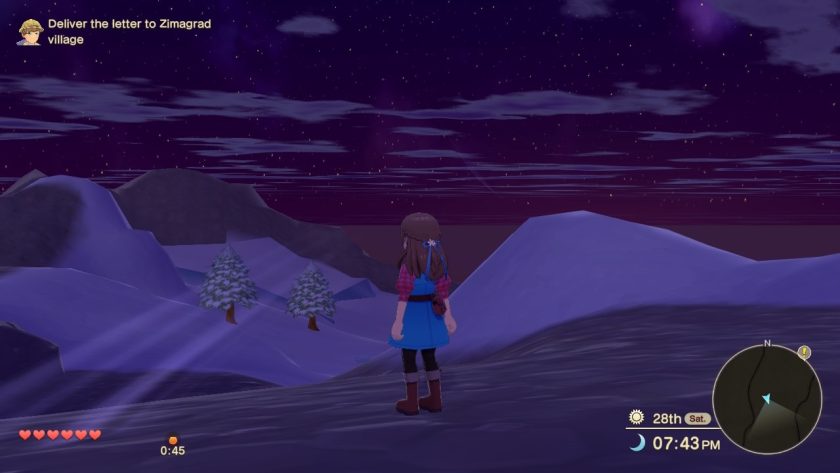 A beautiful vista over a snowy land after nightfall