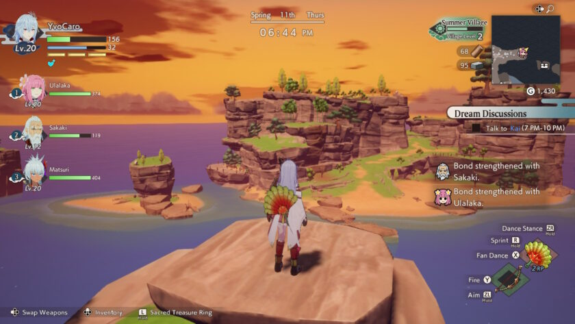 The player character in Rune Factory: Guardians of Azuma stands at the edge of a cliff during a stunning sunset, overlooking scattered rocky islands and lush plateaus surrounded by deep orange skies and purple sea. The interface shows party stats and quest progress titled “Dream Discussions.” Published on: LadiesGamers
