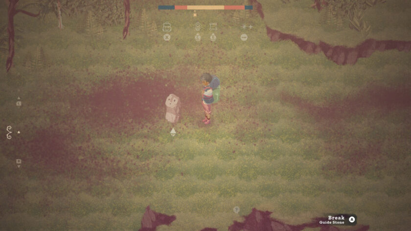 Garden character standing near a guide stone statue.